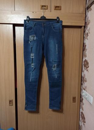 Рвані легкі джинси 50+