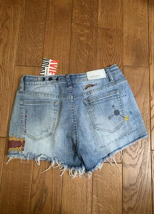 Короткі жіночі джинсові шорти7 фото