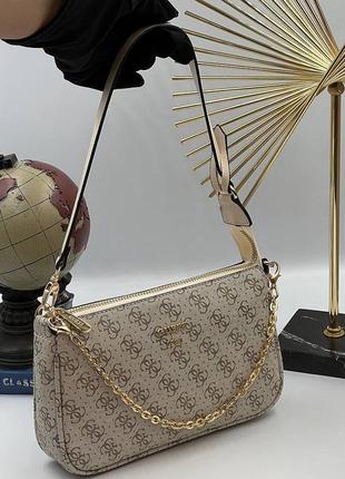 Стильная женская бежевая сумка guess тренд 2022