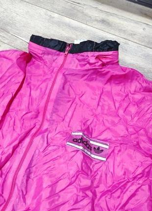 Легка жіноча вітровка для бігу adidas.4 фото