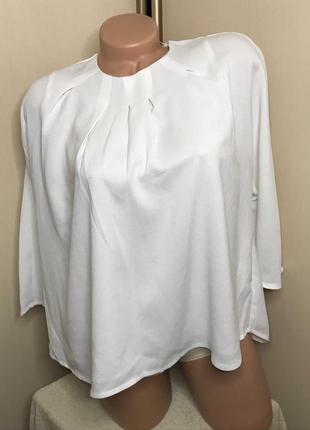 Біла блуза