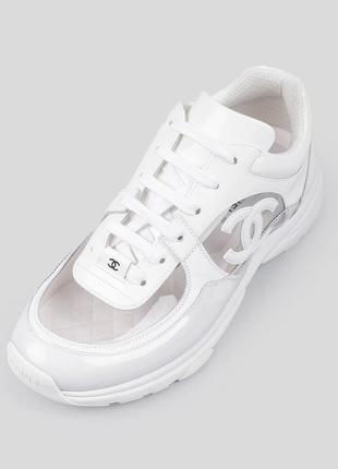 Білі шкіряні кросівки з прозорими вставками