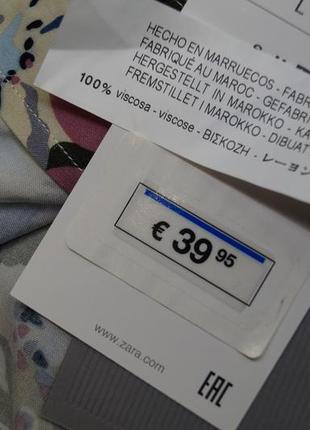 Подовжена класична теніска, широкі рукави,тропічний принт листя, квіти2 фото