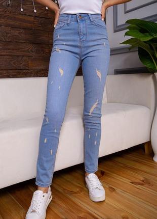 Рваные женские джинсы скинни голубого цвета1 фото
