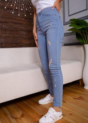 Рваные женские джинсы скинни голубого цвета2 фото