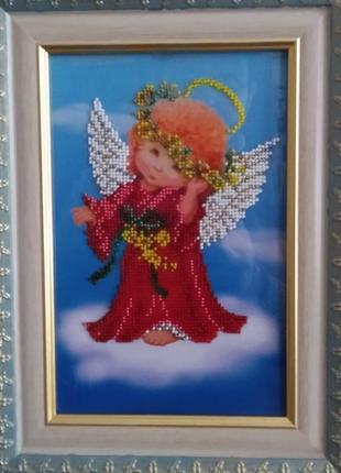 Картина вышитая бисером "ангел с цветами".