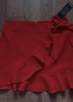 Мини-юбка с завязками спереди и оборками3 фото