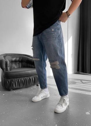 Розпродаж чоловічі стильні рвані джинси мом1 фото