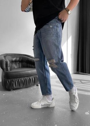Розпродаж чоловічі стильні рвані джинси мом2 фото