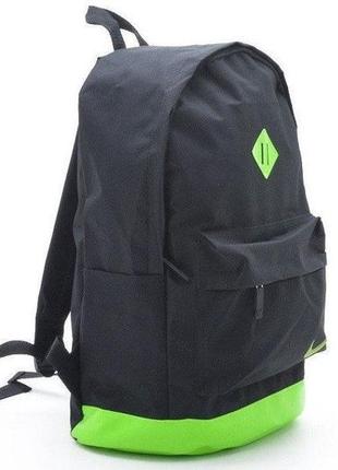 Рюкзак черного цвета с зелёным дном nike3 фото