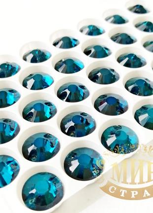 Круглі нашивні камені з плоским верхом, 14мм, колір blue zircon, 1шт