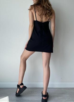 Чёрное трикотажное мини платье7 фото