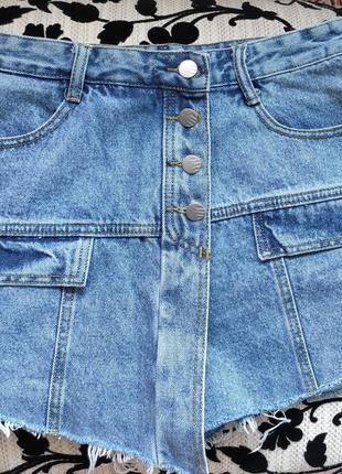 Джинсові шорти,джинсова спідниця1 фото