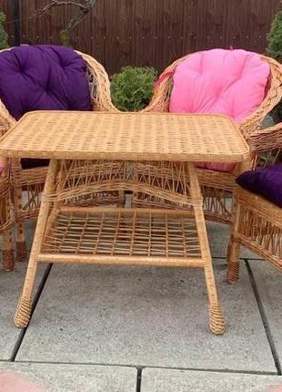 Садовая плетеная мебель с гармоничными накидками2 фото