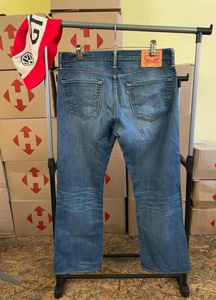 Чоловічі сині джинси levis 5272 фото