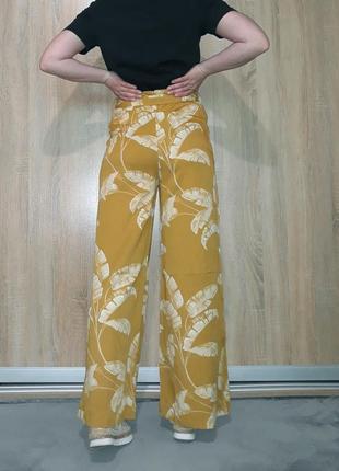 Крутые брюки палаццо с карманами на высокой посадки из вискозы7 фото