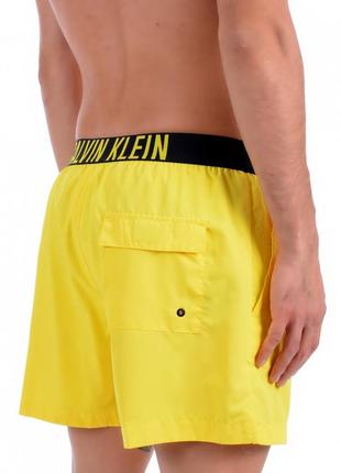 Яркие пляжные плавательные шорты calvin klein men's chino swim shorts2 фото