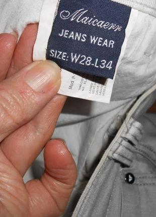 Стильные джинсы серо-белого цвета.2 фото