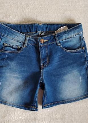 Класні стрейчеві джинсові шортики ,вказано на р. 140.1 фото