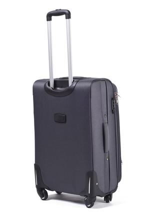 Велика сіра валіза дорожній чемодан розмір l валіза текстильна на 4 колеса wings тканинна валіза велика3 фото