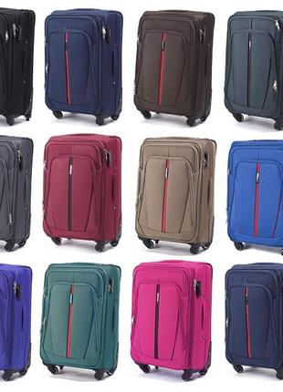 Велика сіра валіза дорожній чемодан розмір l валіза текстильна на 4 колеса wings тканинна валіза велика8 фото