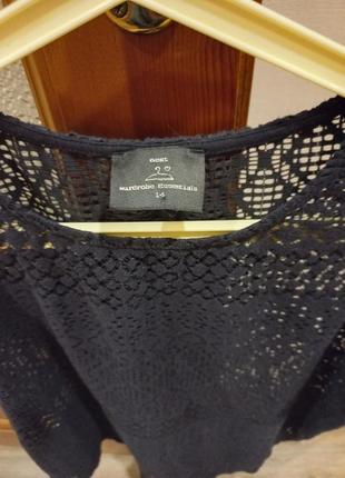 Жіноча мереживна блузка без рукавів2 фото