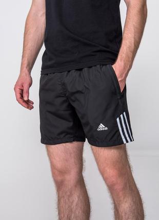 Чоловічі чорні спортивні шорти adidas з плащівки2 фото