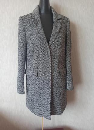 Стильне зручне жіноче пальто1 фото