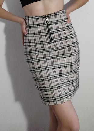 Спідниця ручної роботи в клітинку з круглим замком