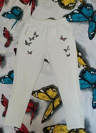 Білі брючки штани з метеликами, є катишки