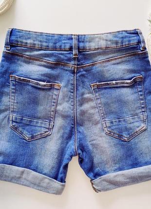 Модные джинсовые шорты с потертостями  артикул: 118583 фото