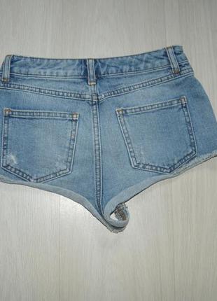 Секси ультракороткие джинсовые шорты на кнопках3 фото