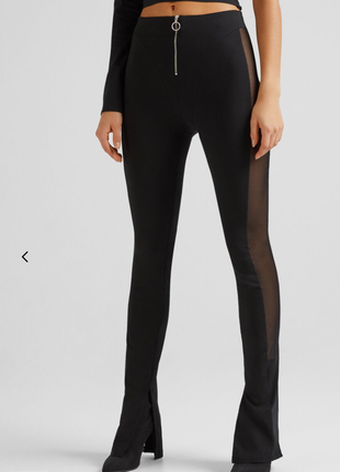 Штани skinny кльош з контрастною вставкою з напівпрозорої