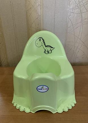 Горшок «динозавр» с музыкой.