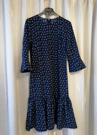 Сукня повітряна з воланом по подолу і двома бічними кишенями розмір не вказаний показати подрузі, за