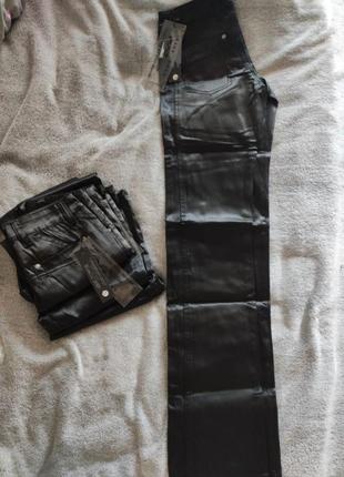 Чорні брюки в полосочку1 фото