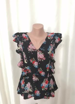 Блуза в квіточку без рукавів