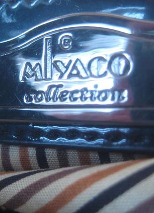 Компактна сумочка фірми mlyaco (італія), стан нової4 фото