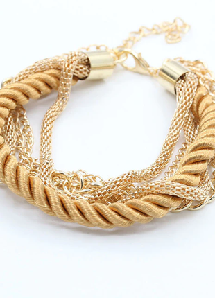 Жіночий багатошаровий плетений браслет золотистого кольору1 фото
