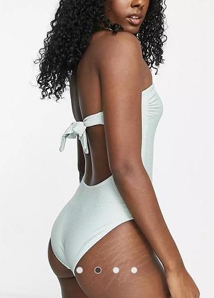 Салатовый слитный купальник бандо в рубчик