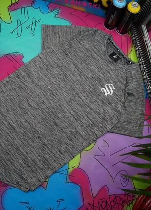 Подовжена меланжева стрейч футболка із закругленим низом