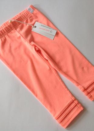 Яркие лосины с отделкой