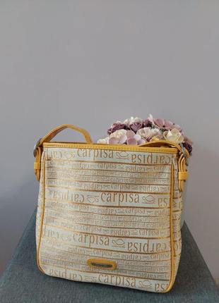 Зручна сумочка від відомого бренду carpisa1 фото