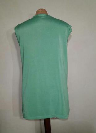 Блузка зеленая трикотажная donna.2 фото