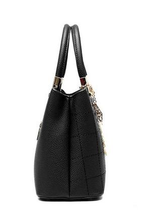 Модна жіноча сумка з брелком, стильна велика жіноча сумочка еко шкіра6 фото