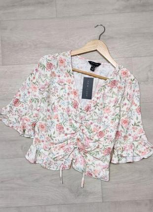 Молочна блуза в квіти