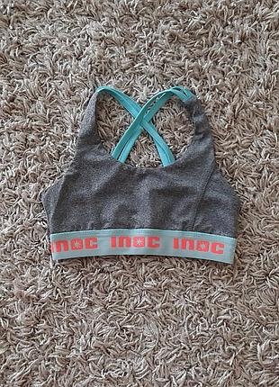 Стильний спортивний топ inoc 134-140 розміру.