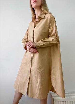 Бежева сукня - сорочка довжини міді1 фото