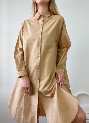 Бежева сукня - сорочка довжини міді8 фото