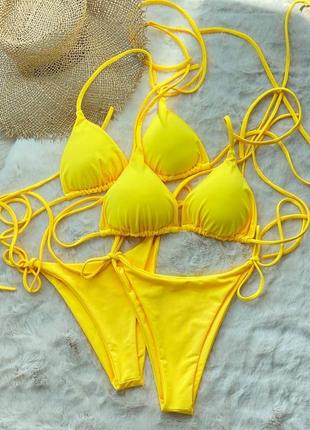 Желтый купальник бикини с завязками2 фото